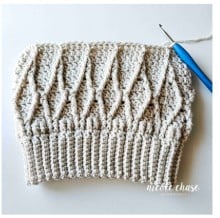 Round 12 through 15 (if applicable) of the Adaleigh Beanie for the sizes that are toddler and up. Showing the textured body of the hat, demonstrating the continuation of the front post double crochet cables for the desired height. 