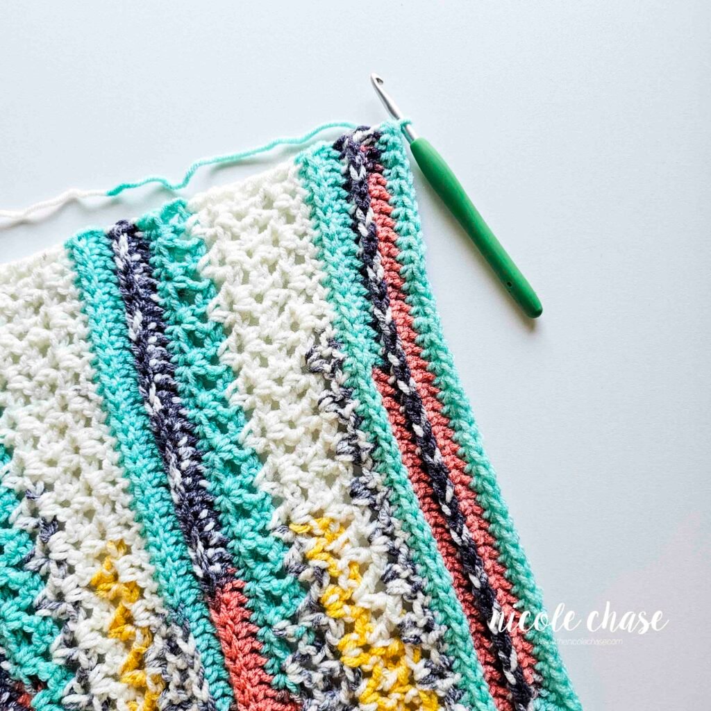 The beginner friendly cowl crochet pattern after all of the rows have been crocheted.