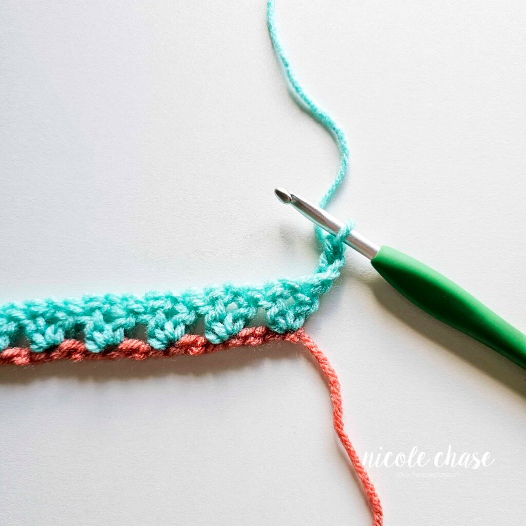 Working R2 of the easy free cowl crochet pattern, part 1.