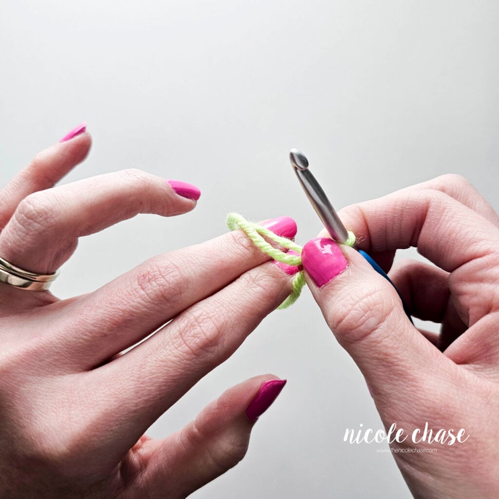 Remove the loops of yarn from your fingers carefully, while holding the loop against the hook.