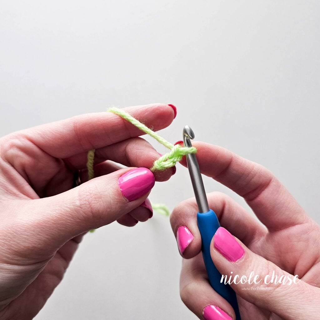 The yarn has been pulled through and the second chain stitch has been completed.