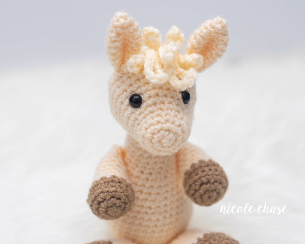 close up of the head on the free llama crochet pattern