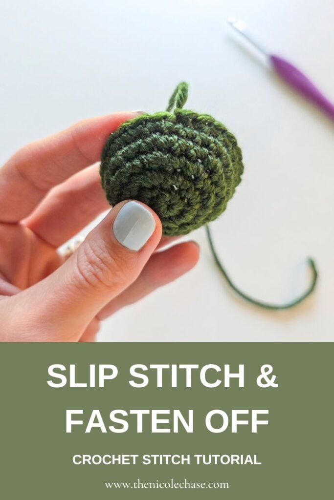 Pinterest graphic featuring a hand holding green amigurumi crochet with text reading Slip Stitch and Fasten Off Crochet Stitch Tutorial from Nicole Chase.