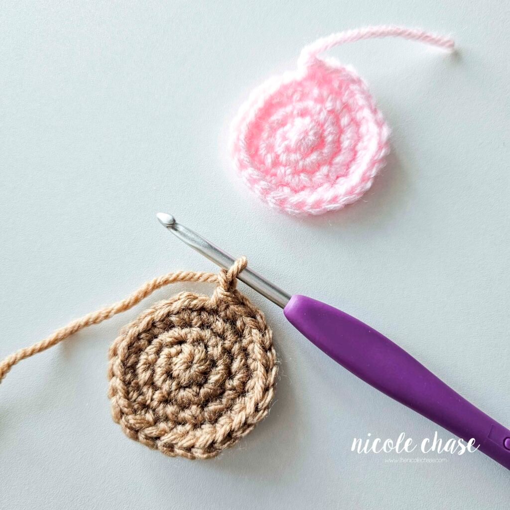 Joining the inner ear and outer ear together for the amigurumi mouse crochet pattern, step 2.