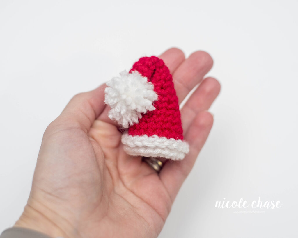 Tiny Santa hat is a fun santa crochet ornament 
