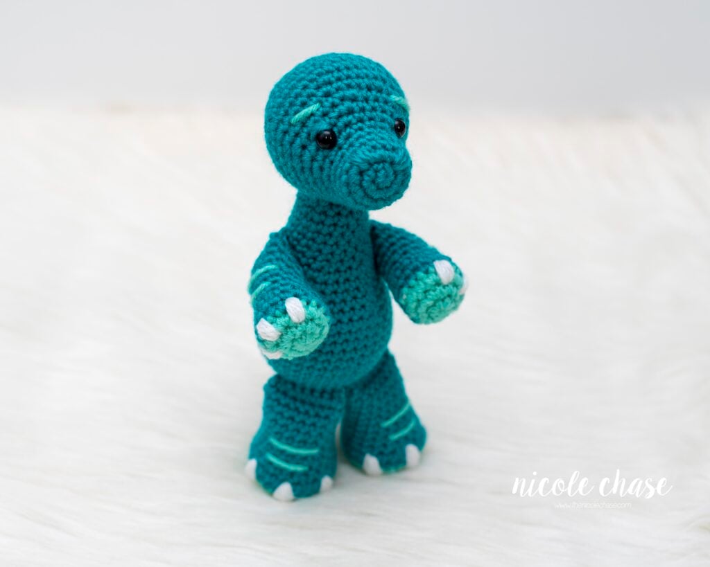 Brontosaurus crochet pattern in teal and mint colors