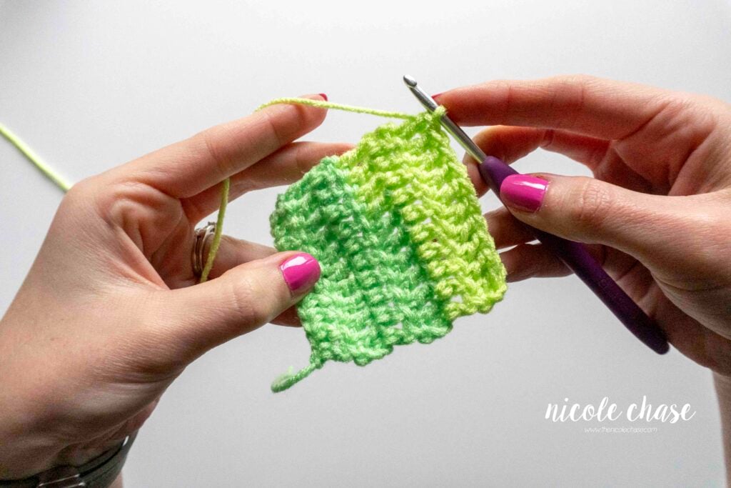 swatch of green yarn made of the double crochet stitch