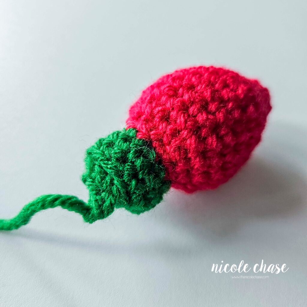 Closing up the final round of the crochet Christmas bulb base. 