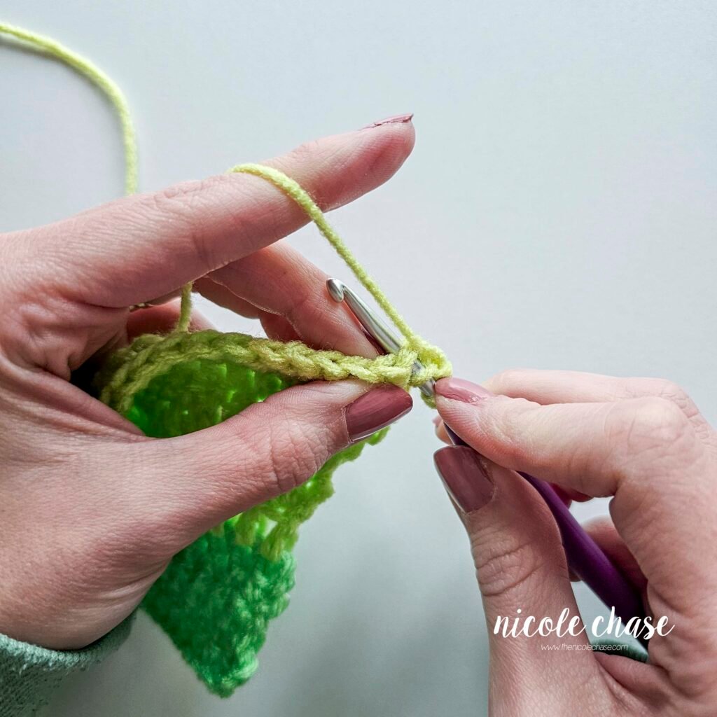 Working a double crochet decrease stitch, step 2.