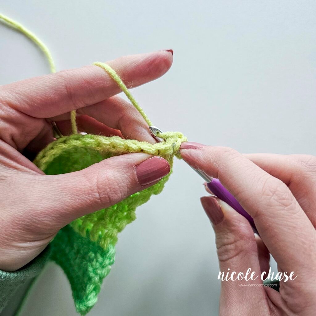 Working a double crochet decrease stitch, step 3.