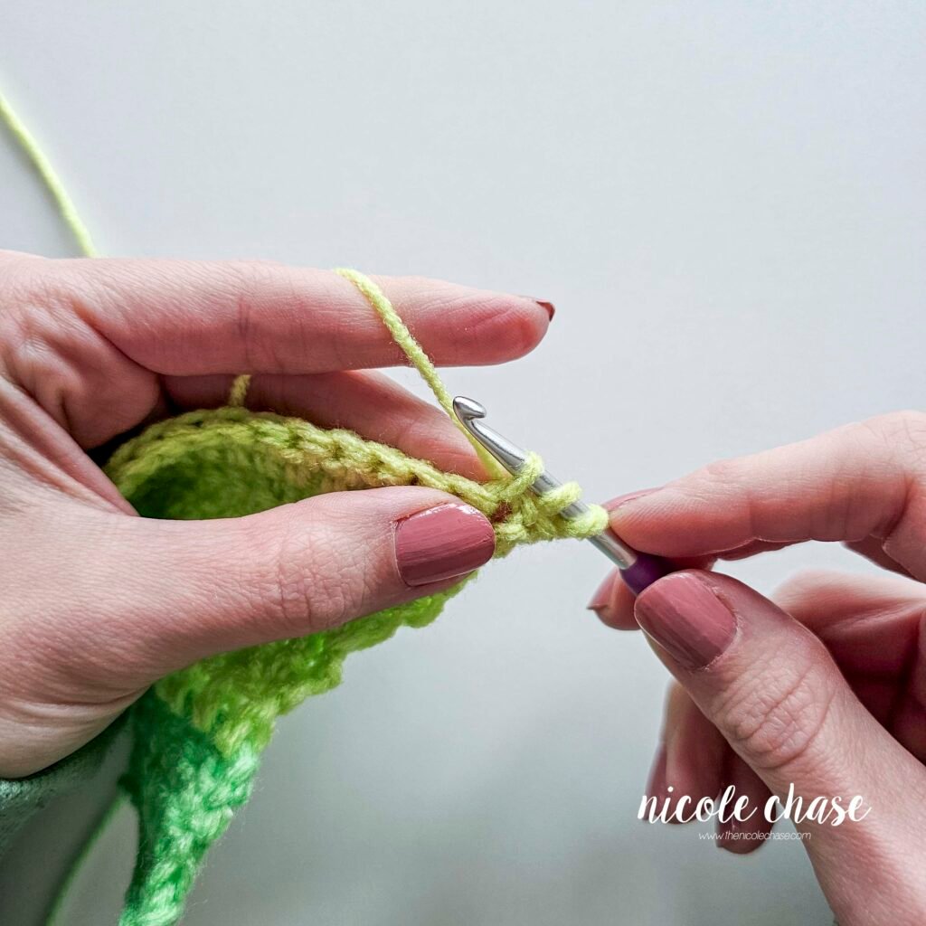 Working a double crochet decrease stitch, step 4.