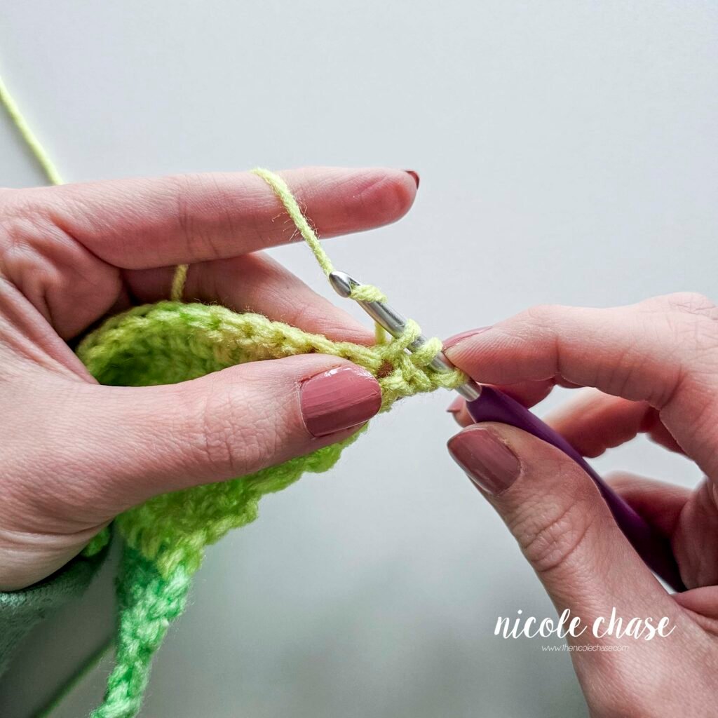 Working a double crochet decrease stitch, step 5.