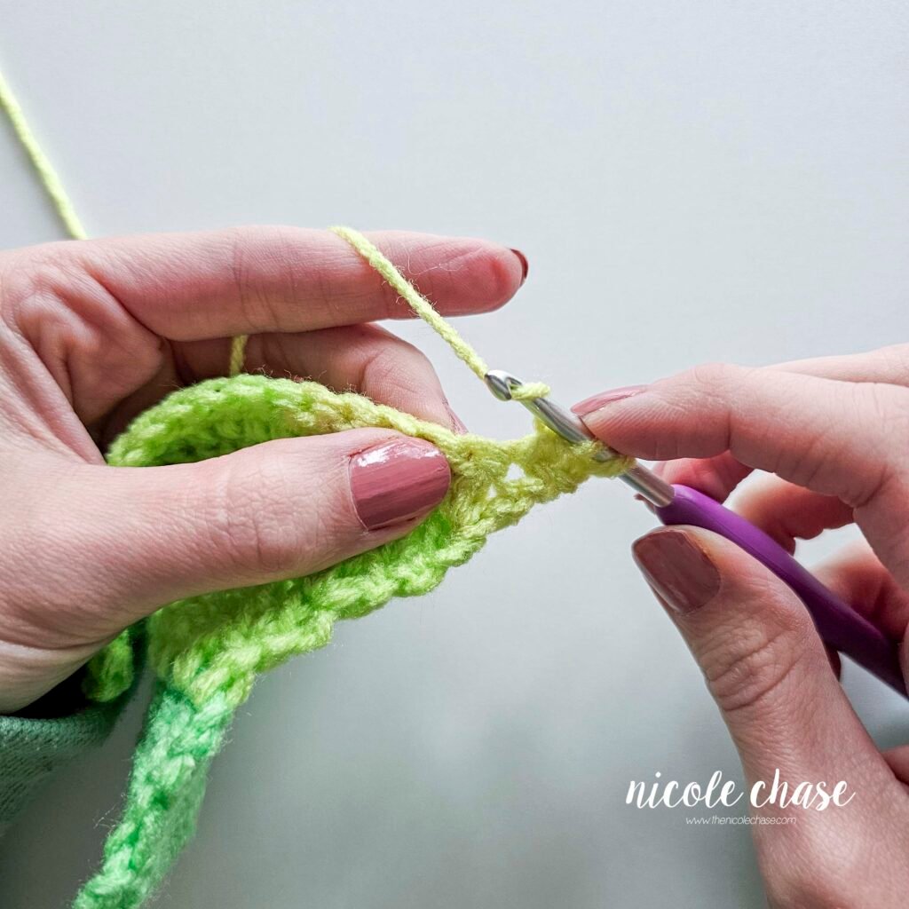Working a double crochet decrease stitch, step 7.