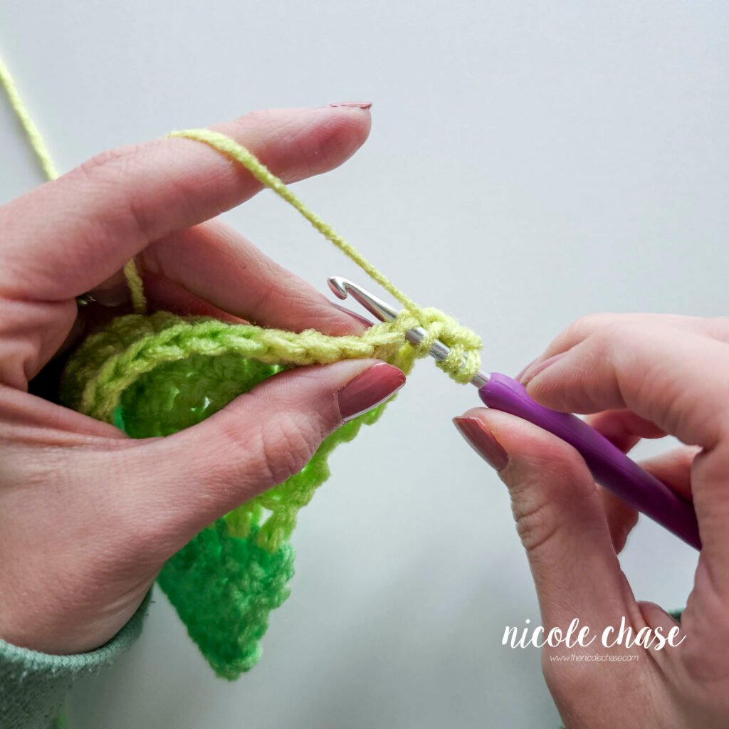 Working a double crochet decrease stitch, step 8.