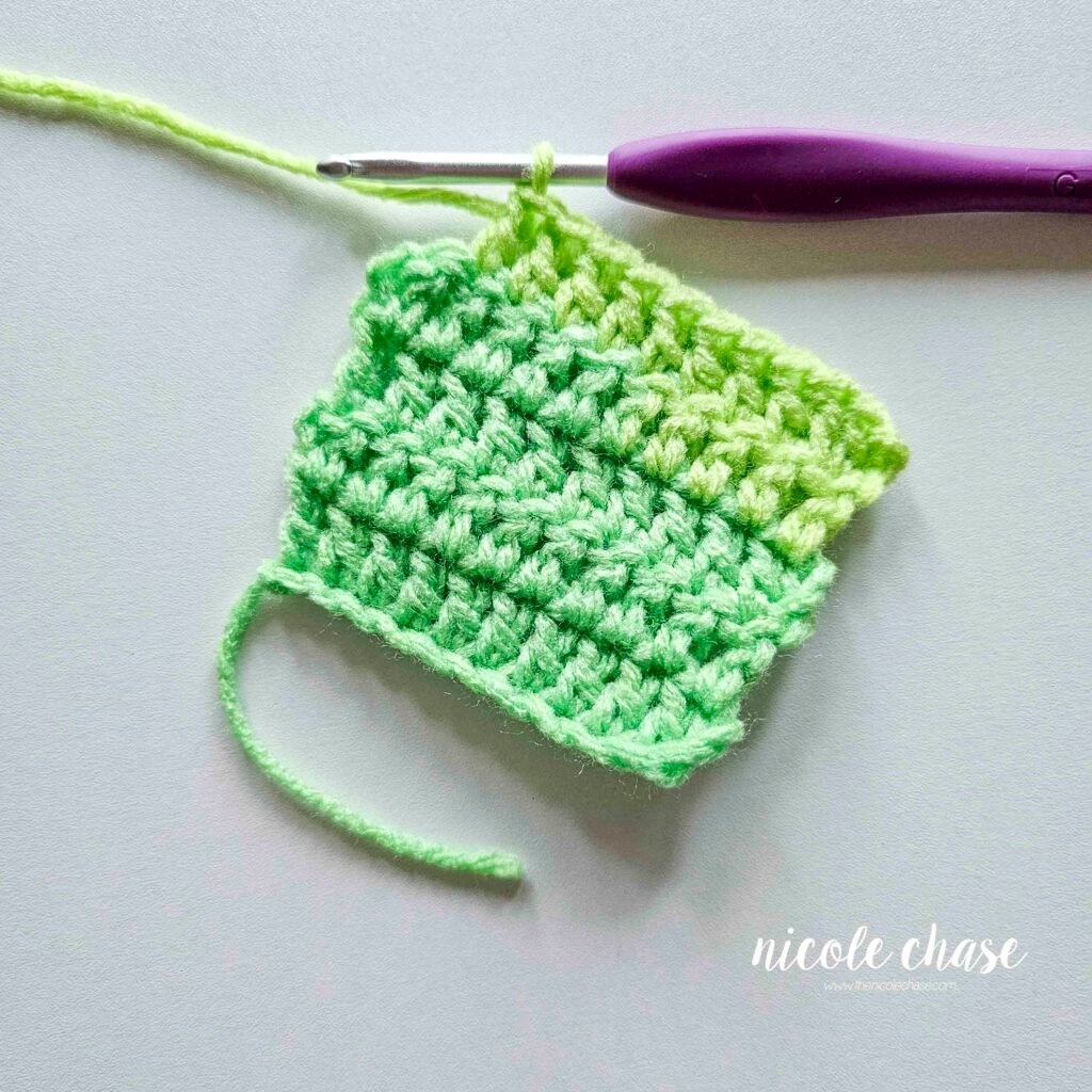 Double crochet swatch showing the end of the first increasing row, prior to adding the final increase.