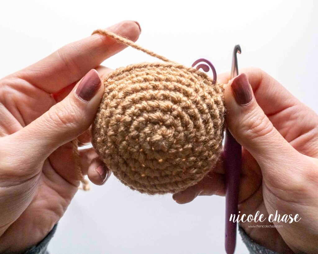 A larger amigurumi piece after it has been successfully flipped. The right side is now correctly exposed on the exterior.