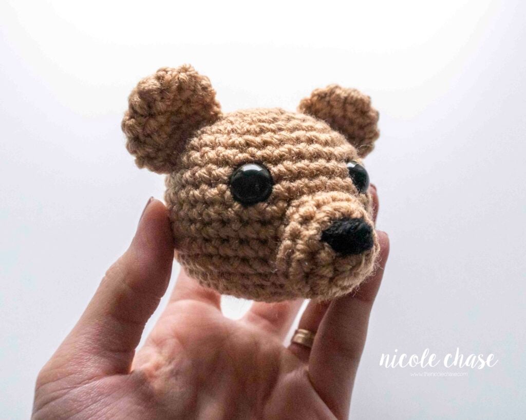 Comparison of amigurumi bear heads showing the smooth right side texture (intended), demonstrating the aesthetic difference in right side vs wrong side crochet.