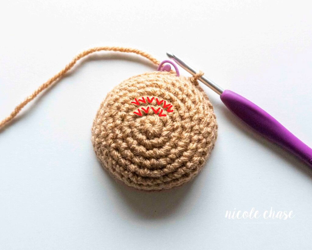 Close-up of the right side of single crochet fabric showing the clean stacked "V" stitches. This visual confirms the smooth texture when differentiating right side vs wrong side crochet.