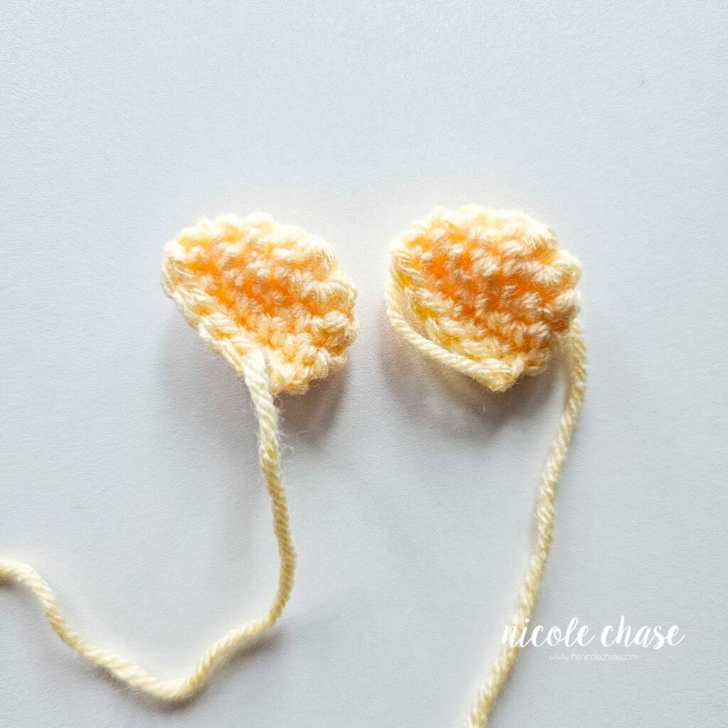 Finished crochet ears for the Hug Me Lion Lovey pattern.