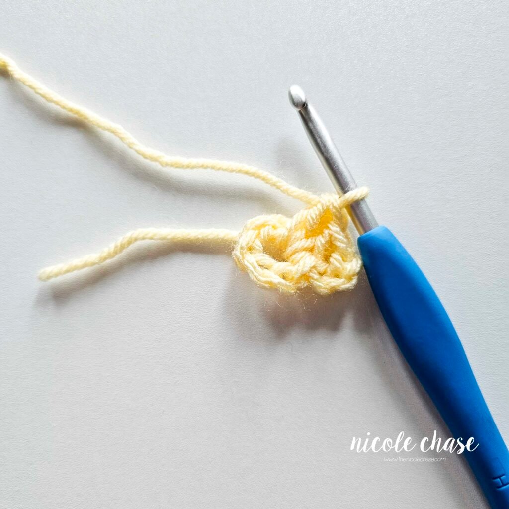R1 of crocheting the blanket portion of the lion lovey crochet pattern, part 4.