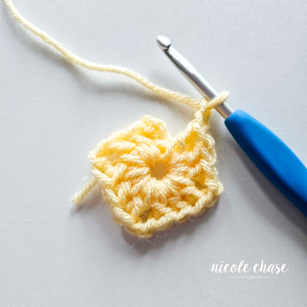 R1 of crocheting the blanket portion of the lion lovey crochet pattern, part 8.