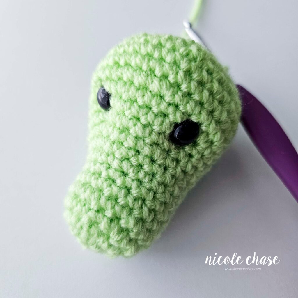 The head of Alan the Alligator after it has been filled with stuffing, prior to the start of the body.