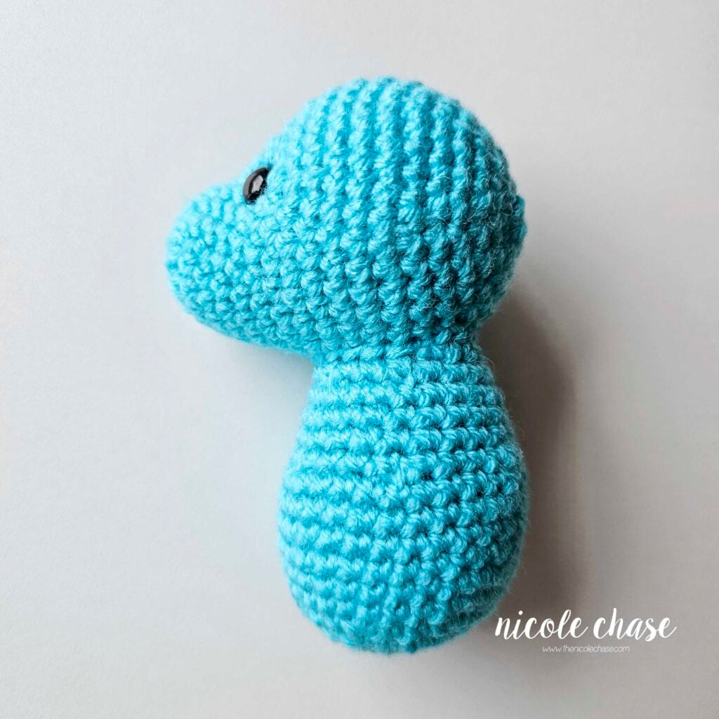 The body and the head have been sewn together, side view.