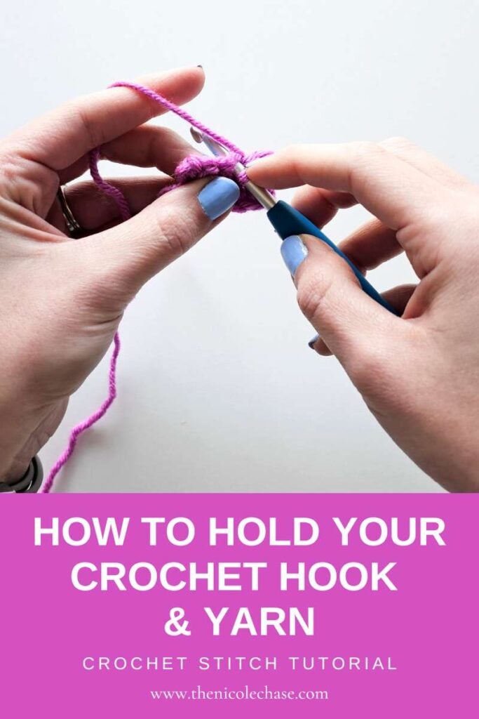 A Pinterest pin graphic with an image of hands holding a crochet hook and yarn, for the beginner tutorial about learning how to hold your crochet hook and yarn with a banner that reads "How to Hold Your Crochet Hook & Yarn" and "Crochet Stitch Tutorial". 
