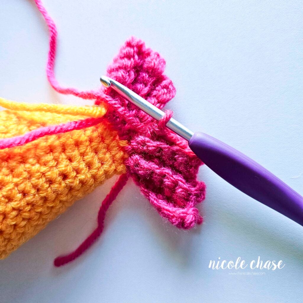 The single crochet stitches of R5 of the tail fin for the amigurumi fish.
