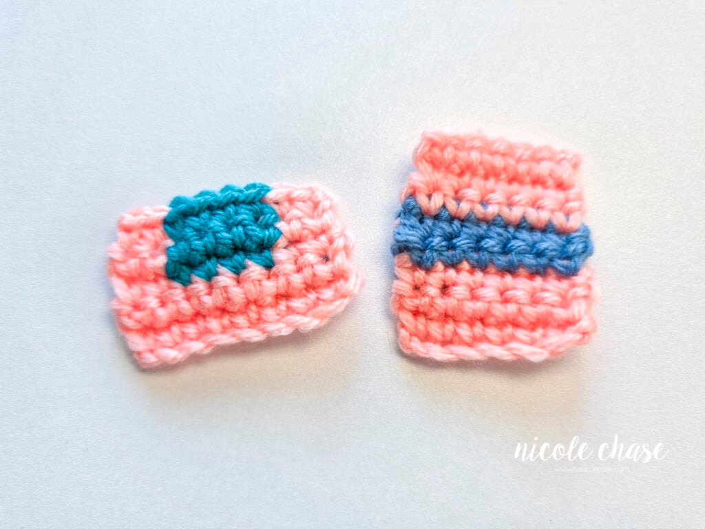 Two crochet swatches resting on a white surface showing yarn color changes in pink, teal, and blue yarn.