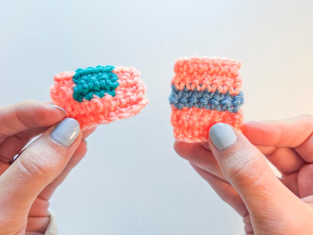 Two crocheted swatches demonstrating how to change yarn colors in crochet, held up against a white background.