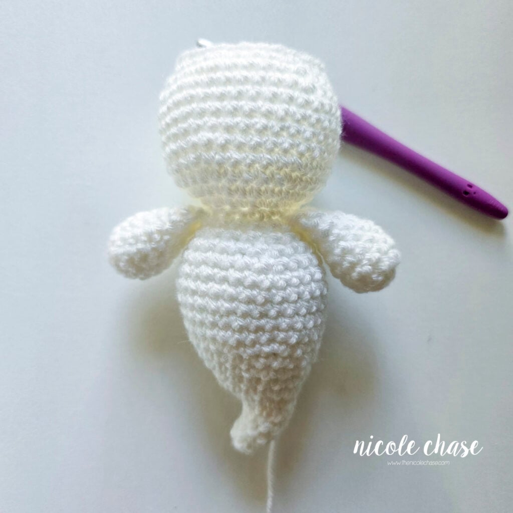 The head of the ghost amigurumi after the completion of R33, before the safety eyes have been placed.